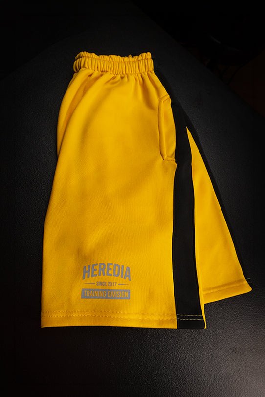 Short Training Division Amarillo/Negro - Heredia Clothing